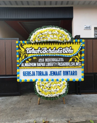 Papan Bunga Duka di Turi